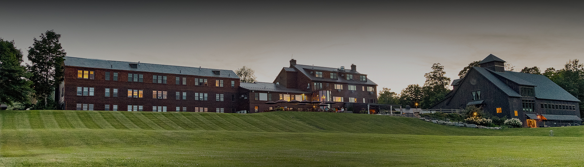 a large building with a large lawn