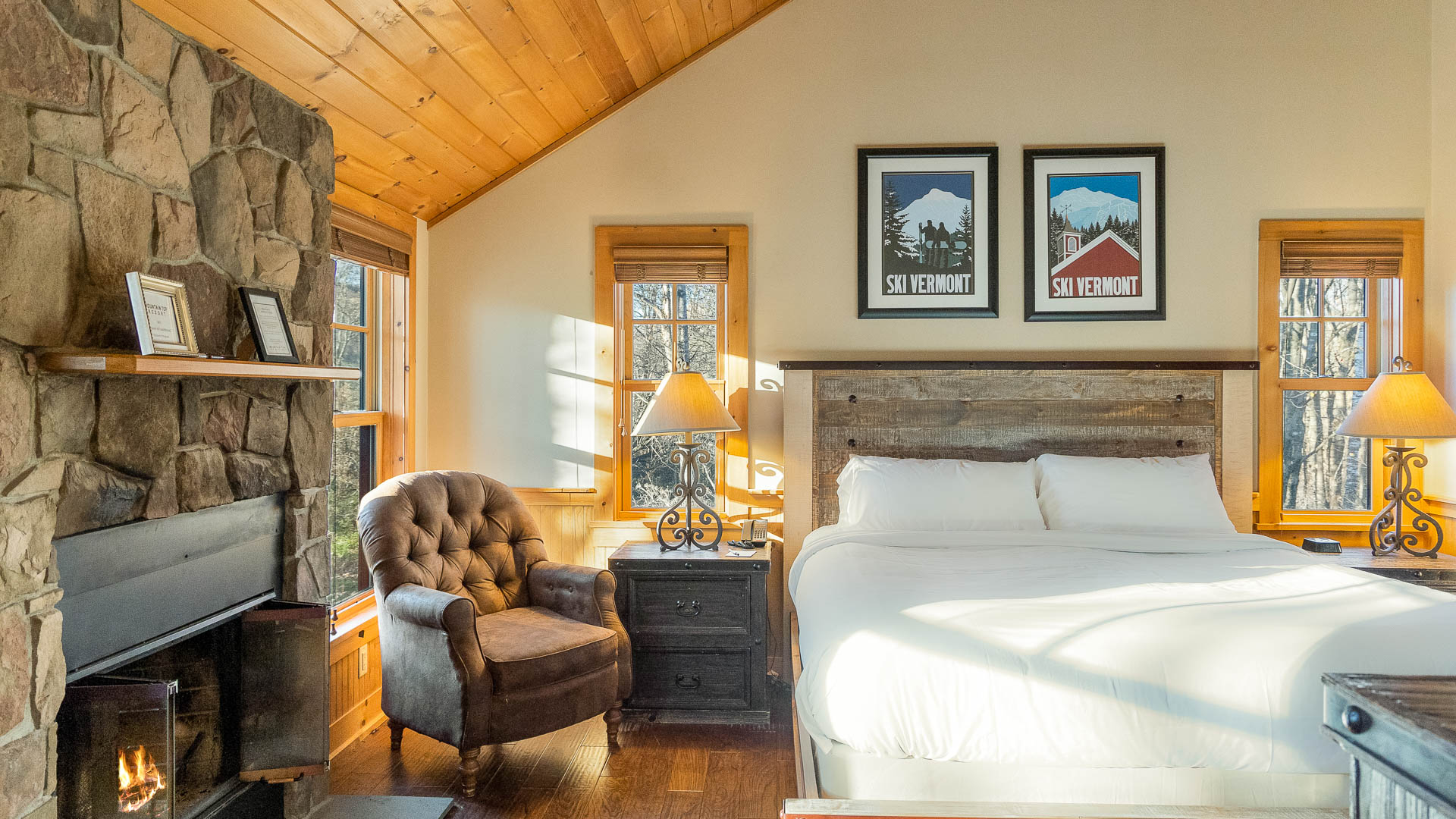 a bedroom with a bed and a chair