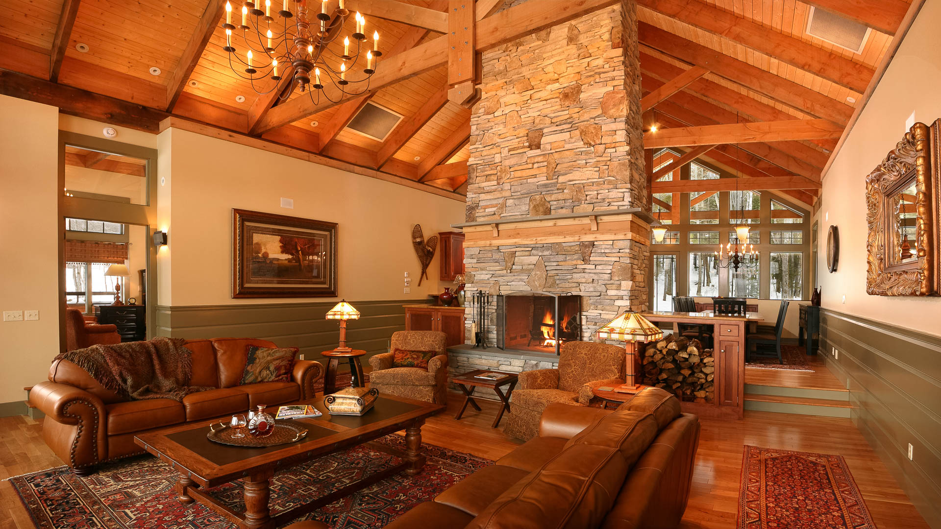 a living room with a fireplace and couches