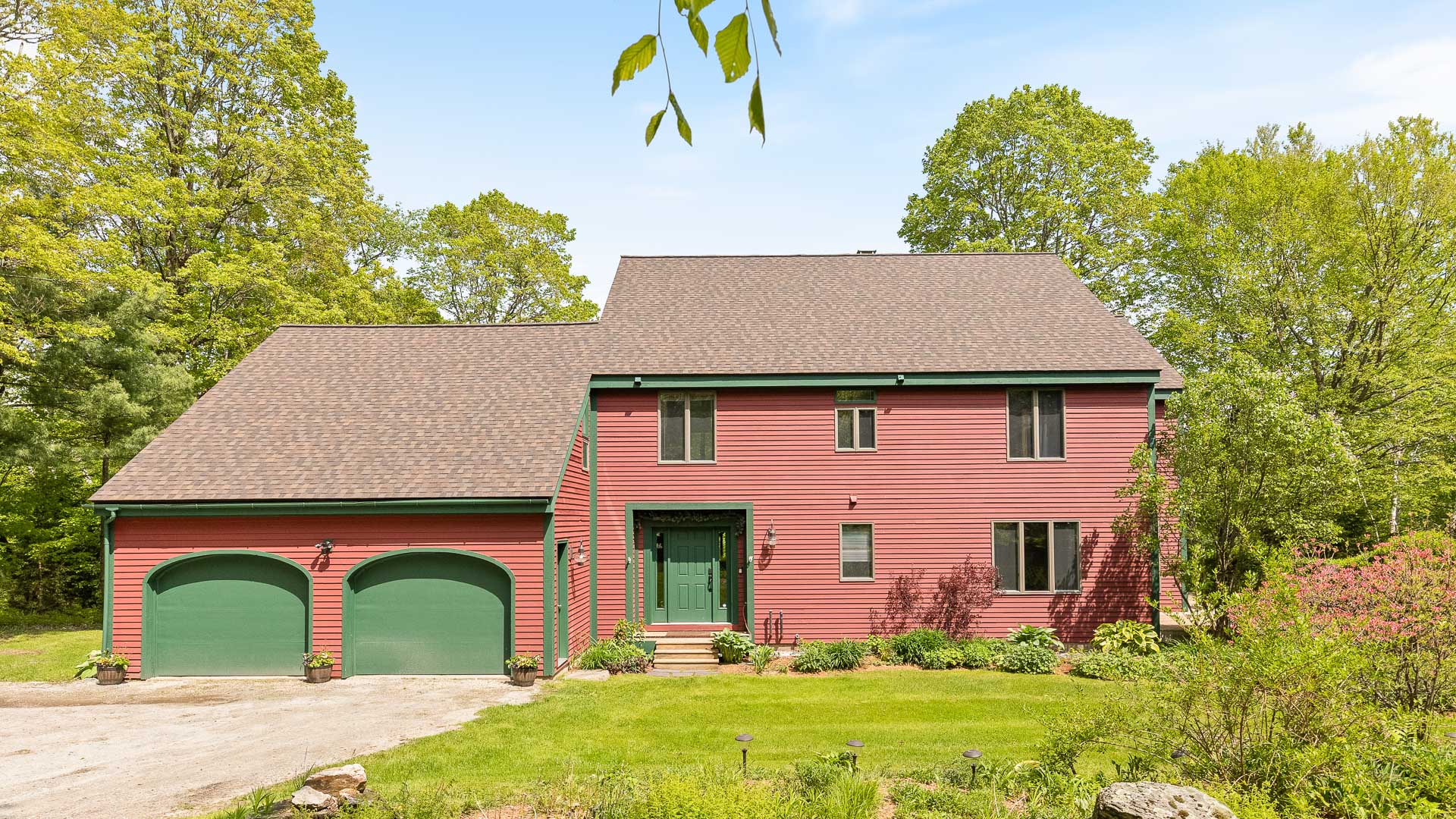 a house with a garage and a lawn