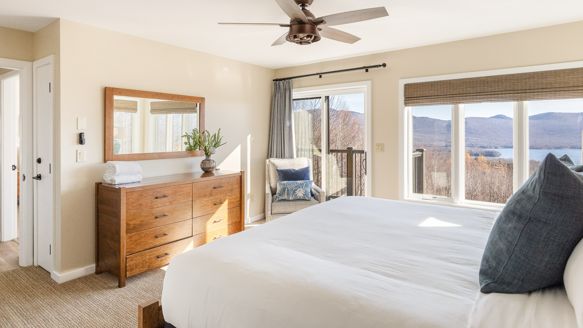 a bedroom with a bed and a dresser