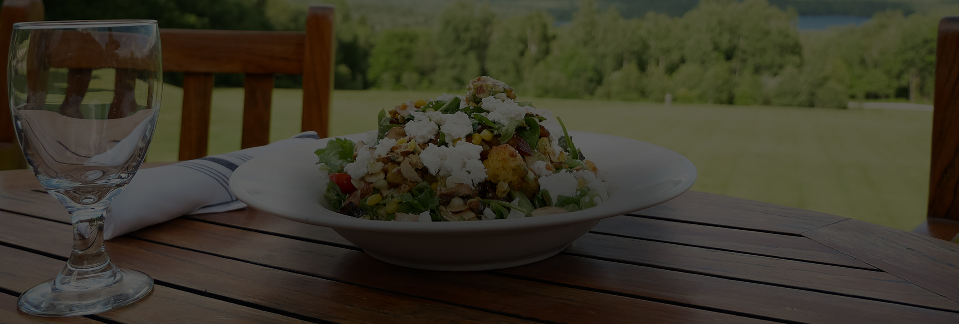 a bowl of salad on a table