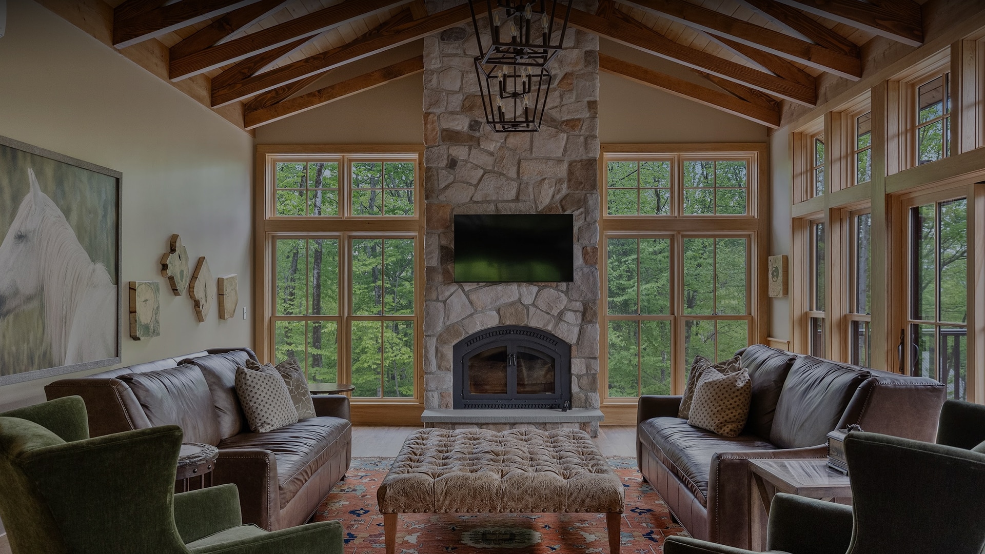 a living room with a fireplace and couches