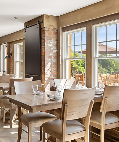 a room with tables and chairs