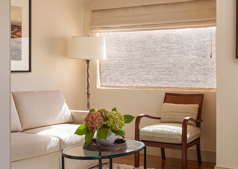 Internal view of a little living room next to a window