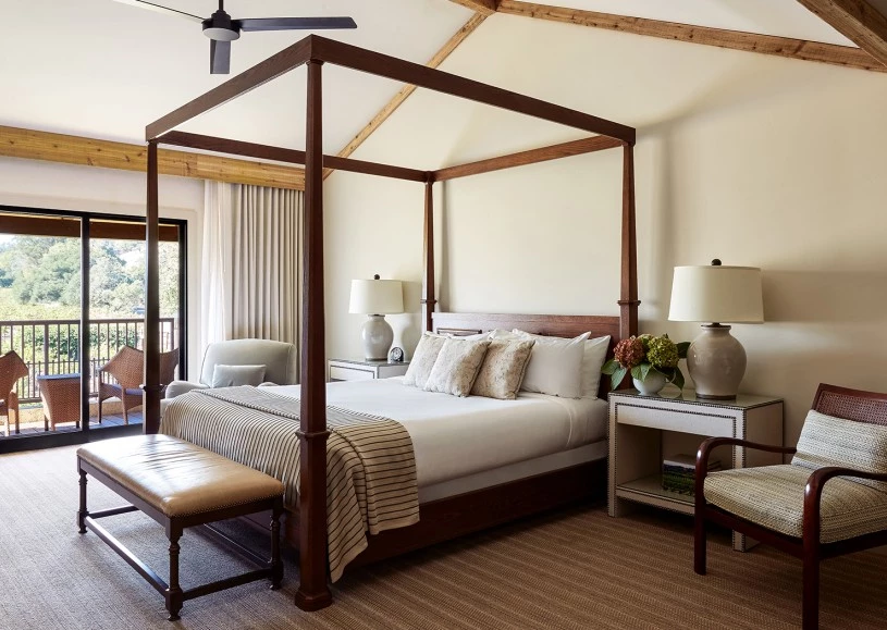 View of a large bed with a private balcony