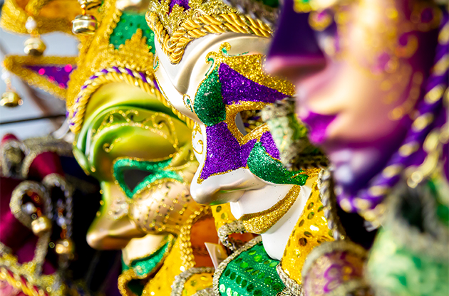 a group of masks on display