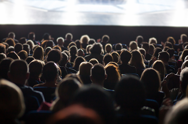 a group of people in a theater