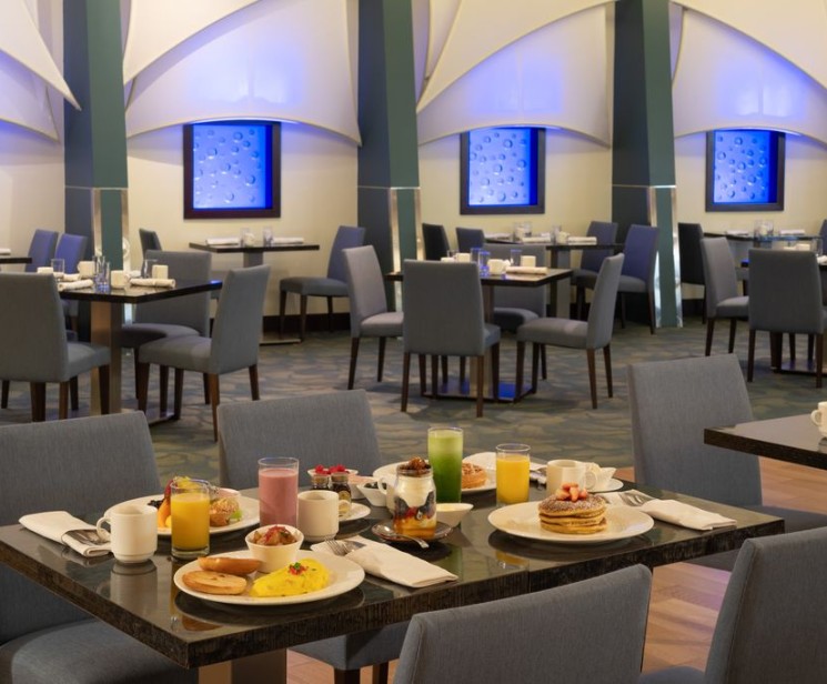 a restaurant with tables and chairs