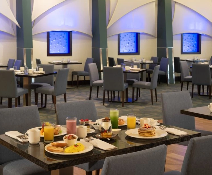 a restaurant with tables and chairs