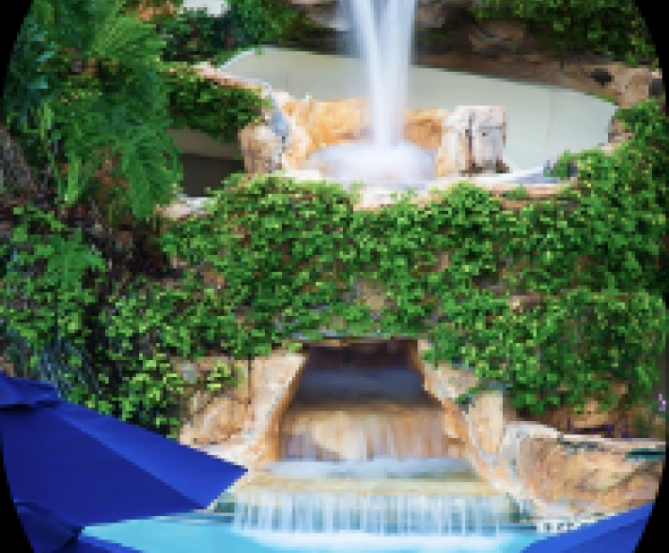 a waterfall in a pool