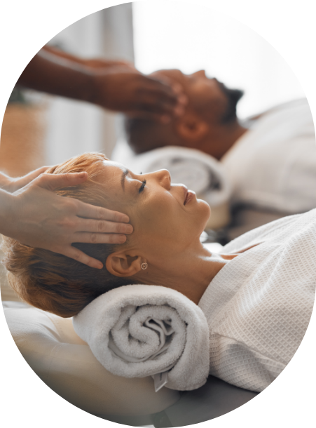 a woman receiving a head massage