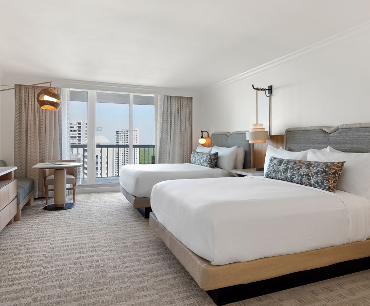 a hotel room with two beds