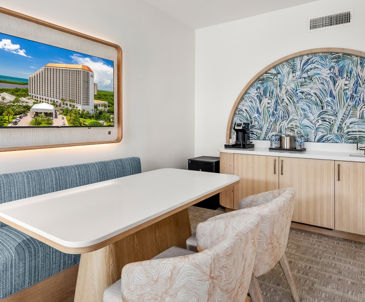a room with a table and chairs