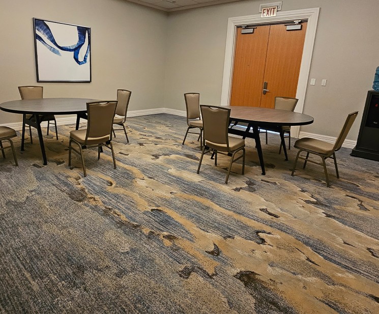 a room with a table and chairs