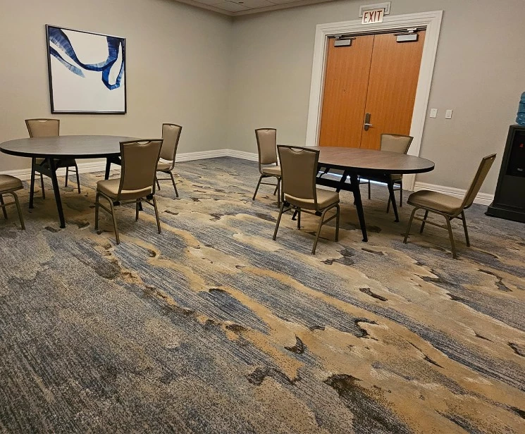 a room with a table and chairs