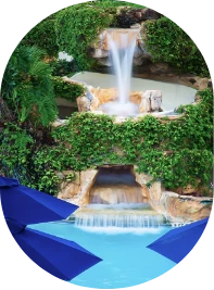 a waterfall in a pool