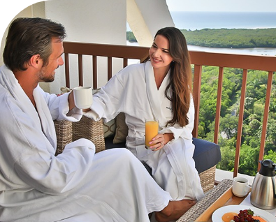 a man and woman in white robes