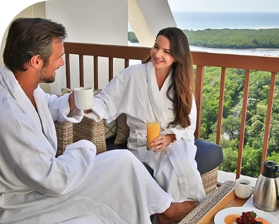 a man and woman in white robes