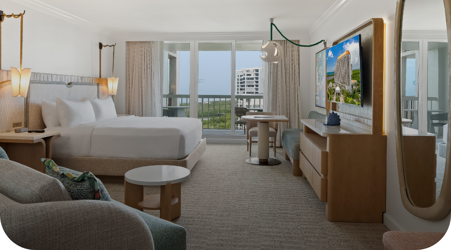 a room with a bed and a television