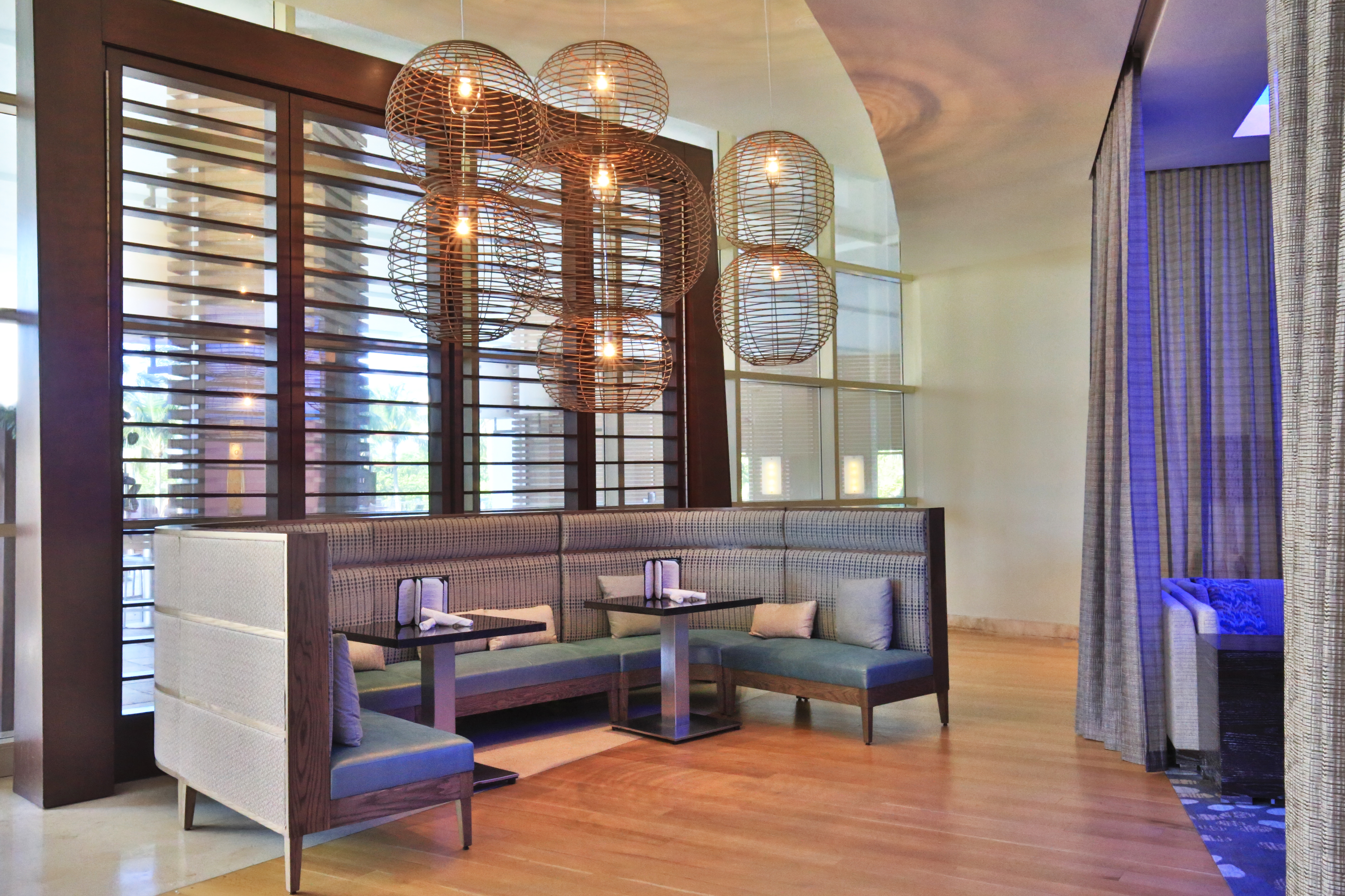 a restaurant with tables and chairs