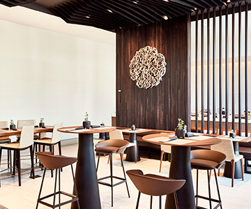 a room with tables and chairs