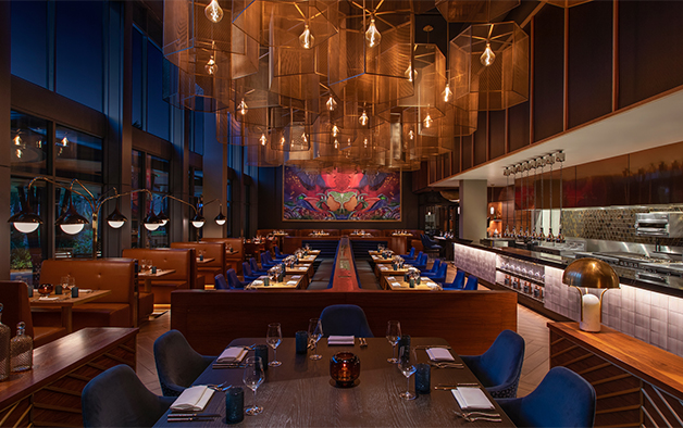 a restaurant with tables and chairs
