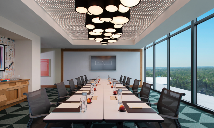 a conference room with a large table and chairs