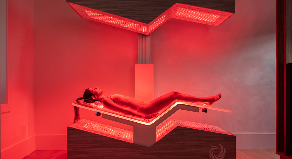 a woman lying on a tanning bed
