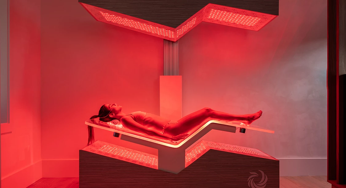 a woman lying on a tanning bed