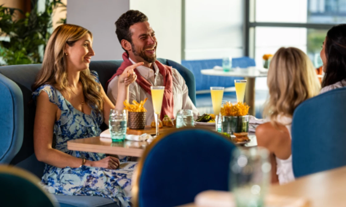 a group of people sitting at a table