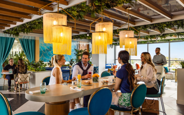 a group of people sitting at a table