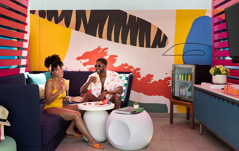 a man and woman sitting on a couch
