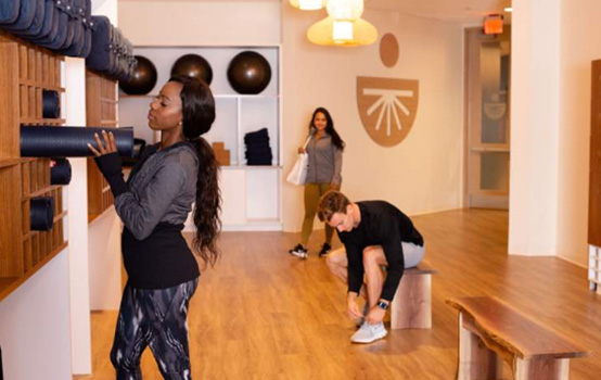 a group of people in a gym