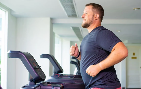 a man running on a treadmill