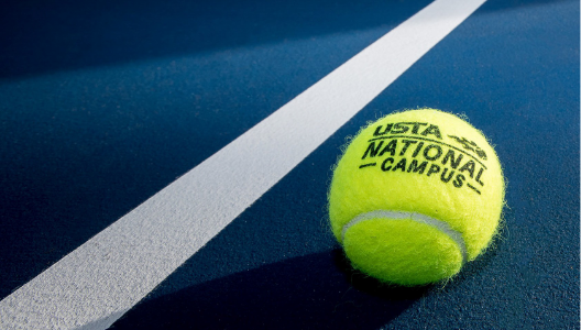 a tennis ball on a blue surface