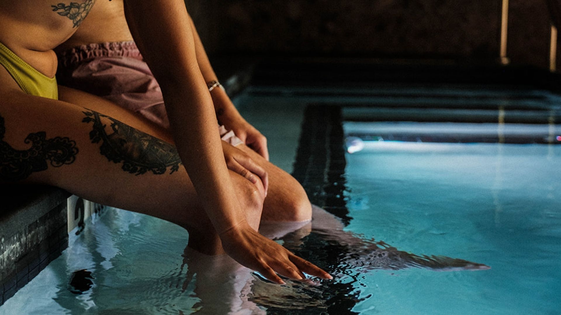 a person sitting in a pool