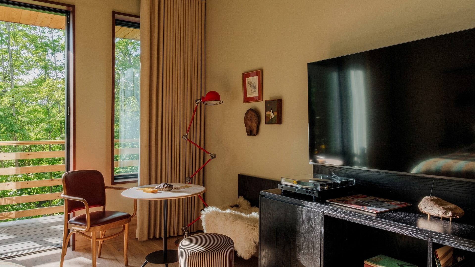 a room with a television and a table