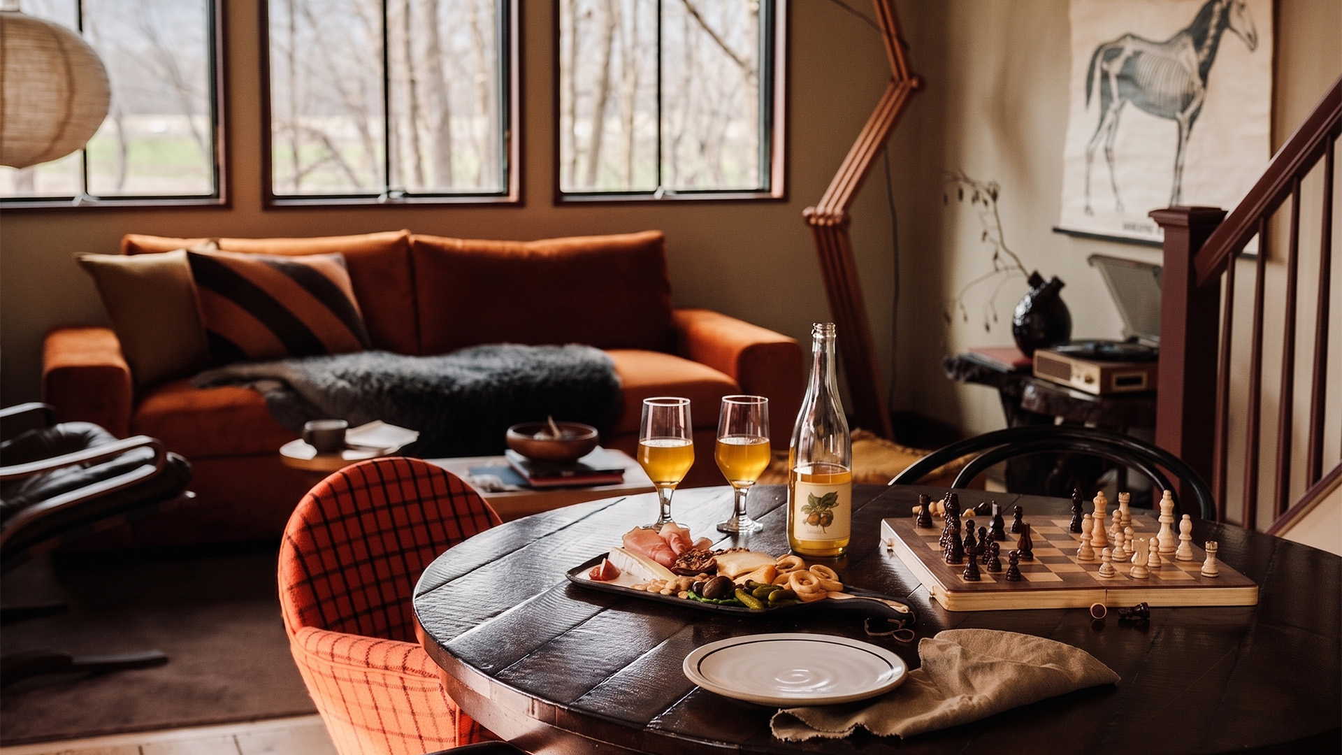 a table with food and wine glasses on it