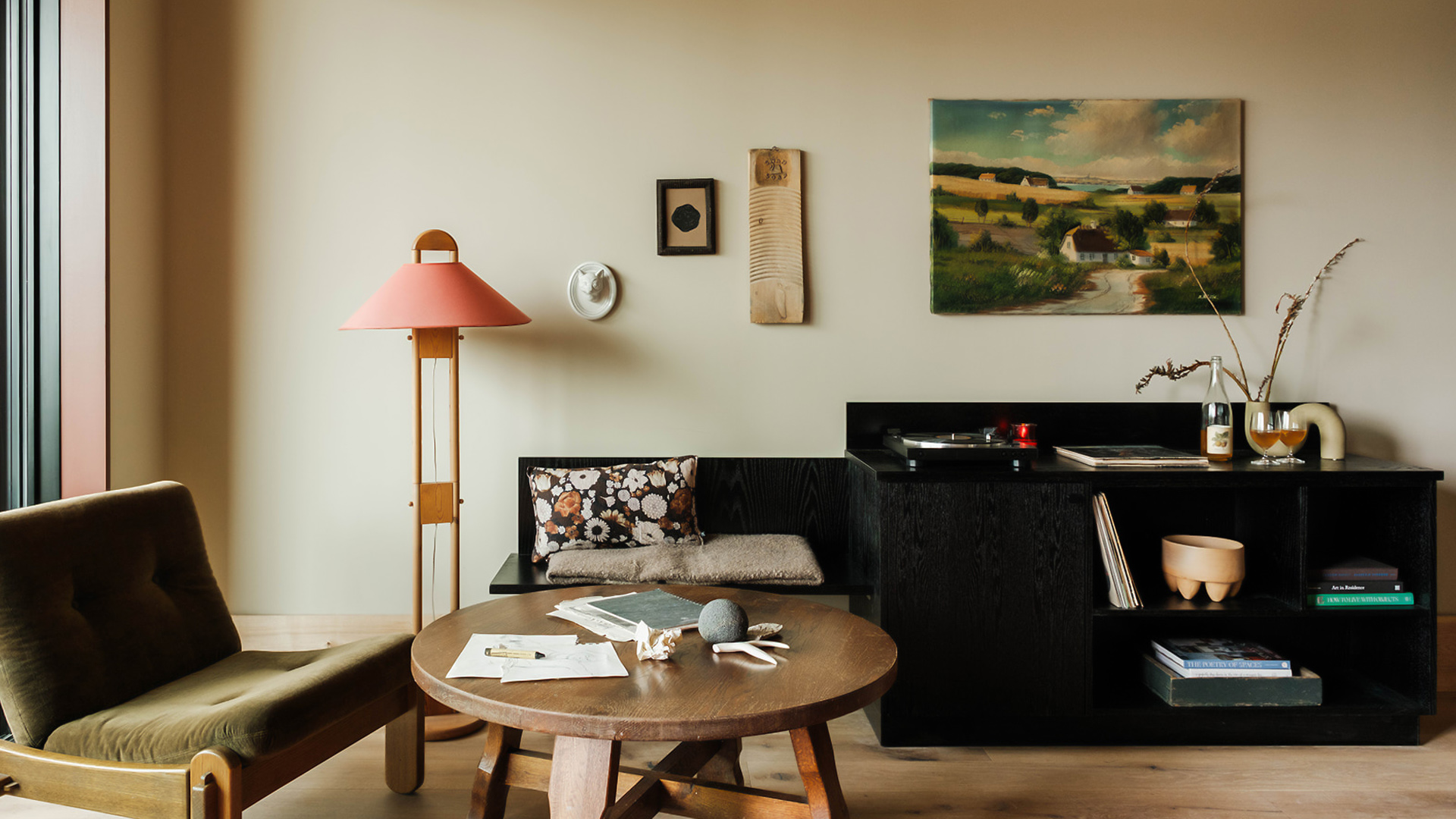 a room with a table and a lamp