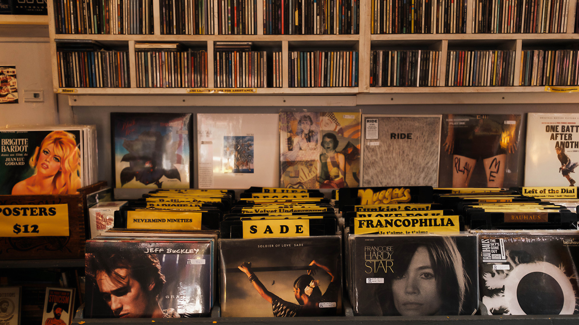 a shelf with records on it