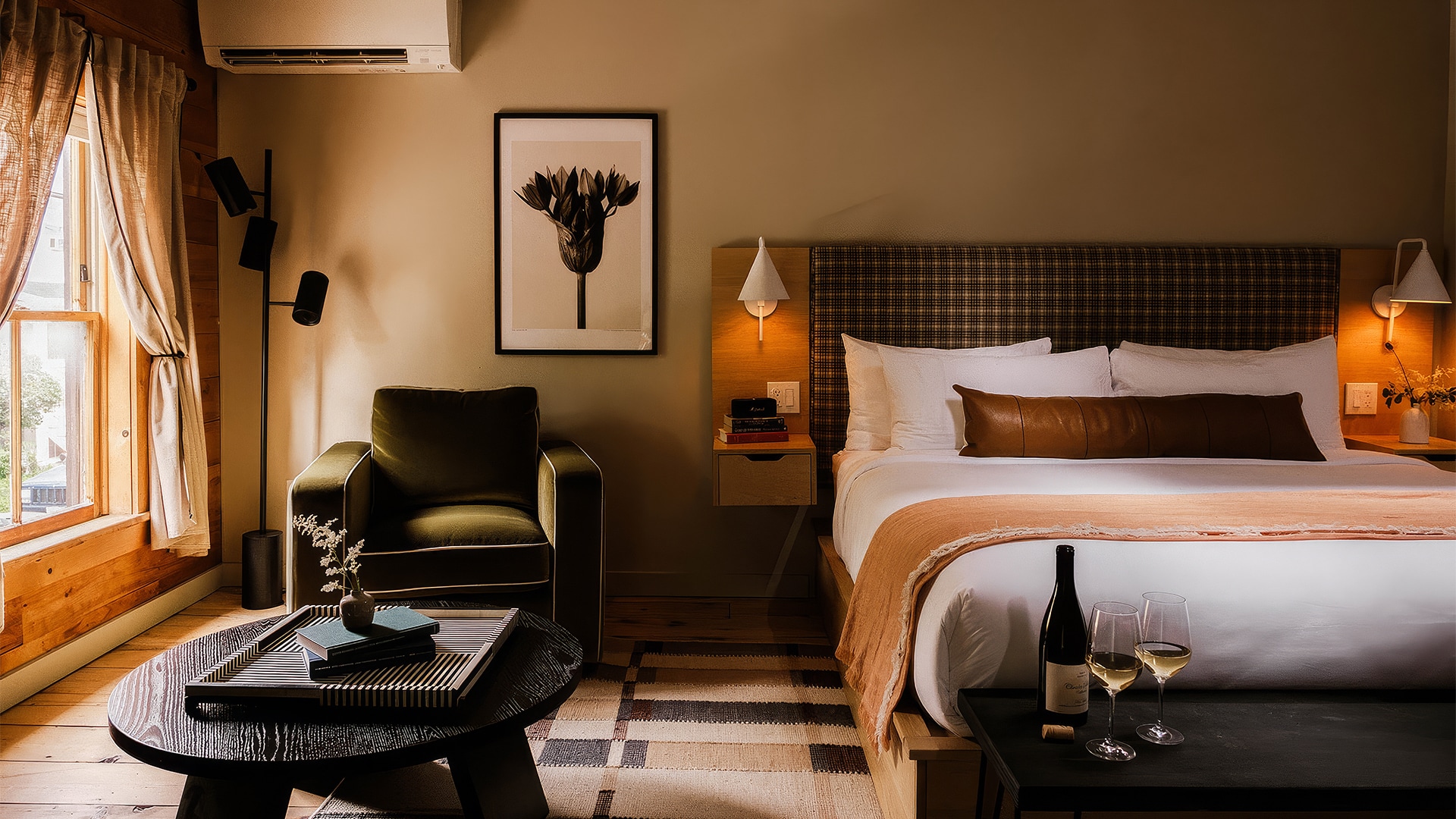 a room with a bed and chair