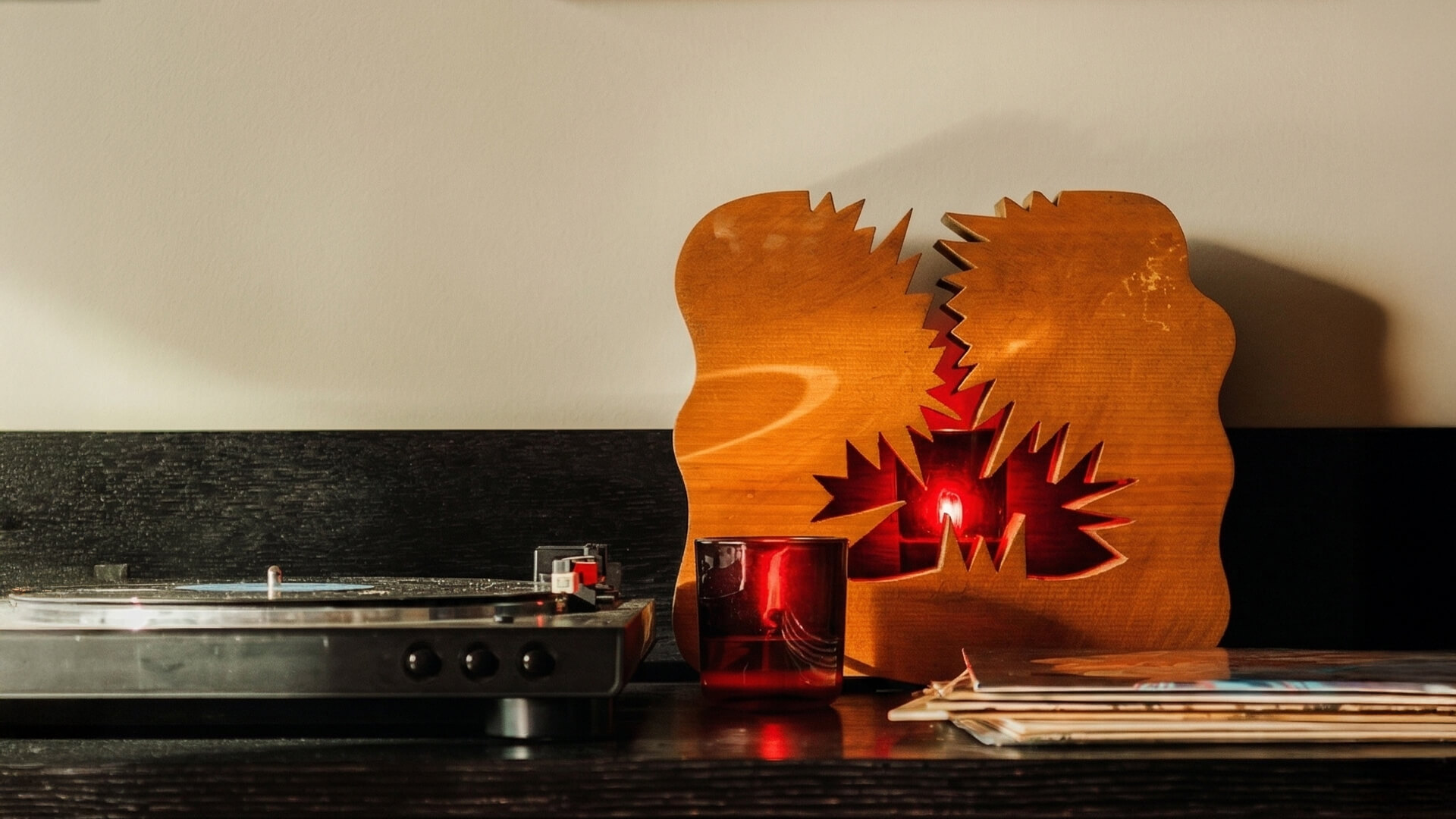a wooden object with a candle inside