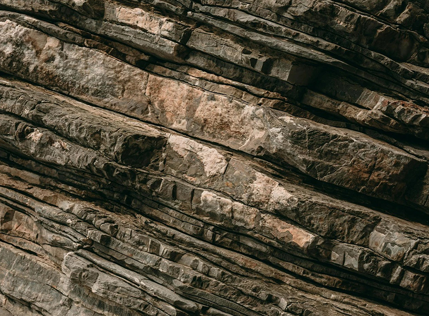 a close up of a rock wall