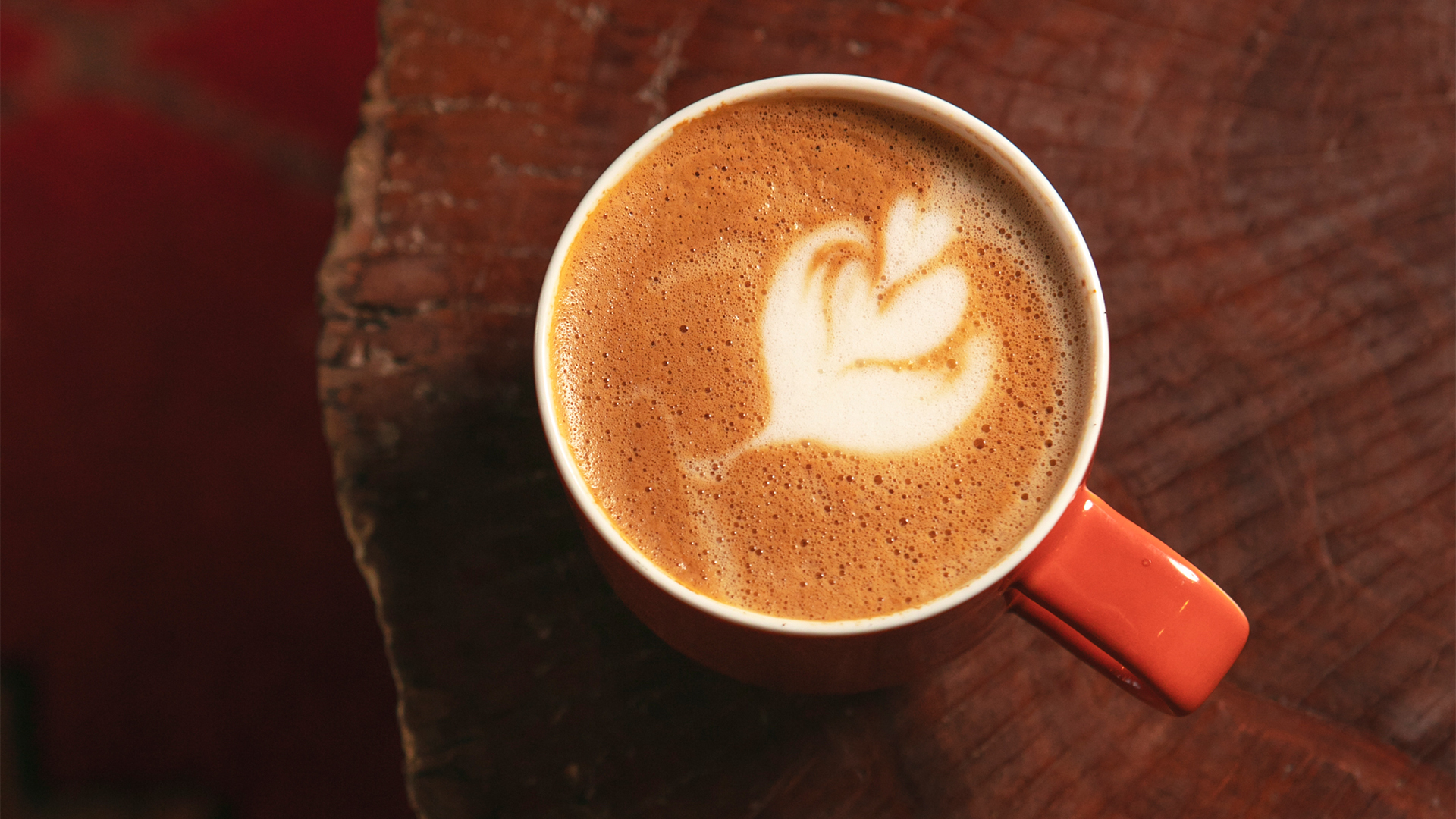 a cup of coffee with a foamy foam in it
