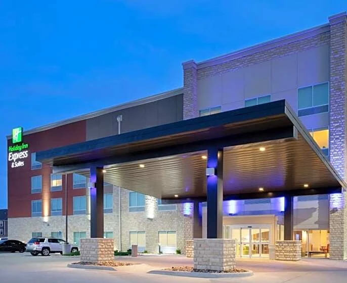 a building with a roof over a parking lot