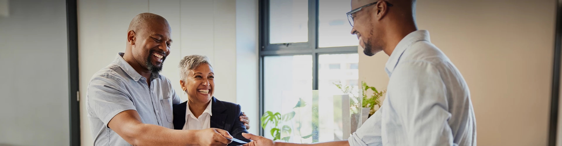 a few business people laughing