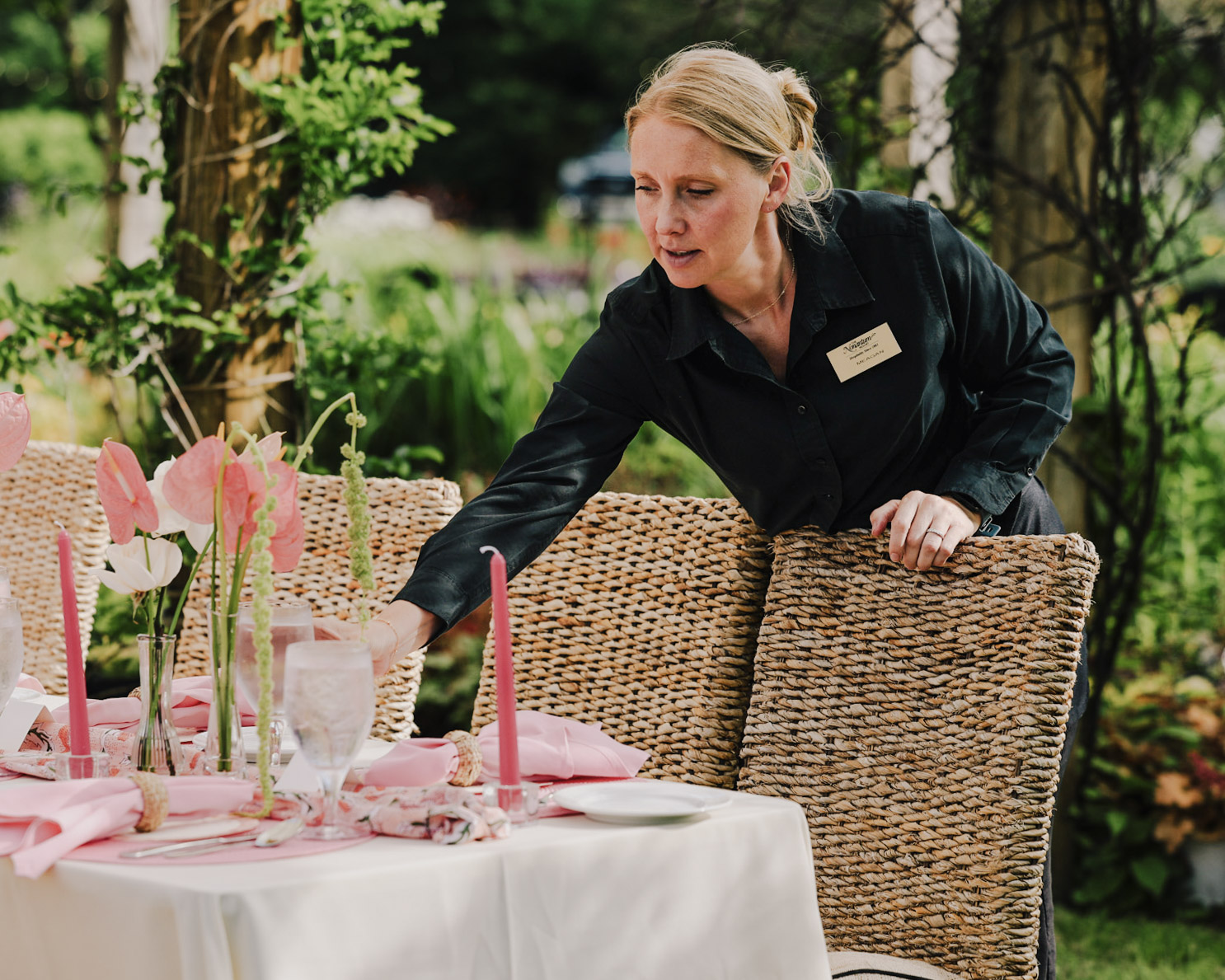 a woman standing at a table