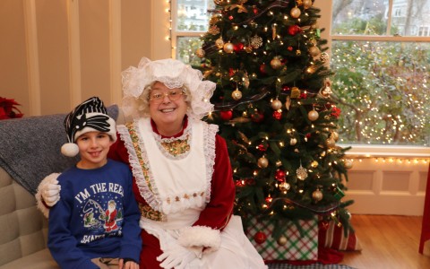 a woman and boy posing for a picture