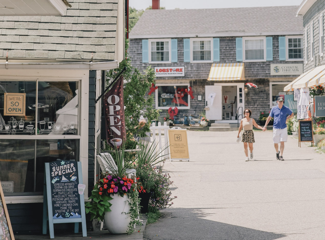 a man and woman walking on a street